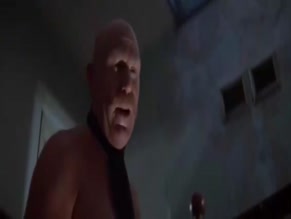 Bald Man with Tie and No Shirt