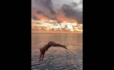 Eva O'Hara bikini dive sunset