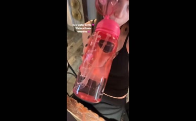 Ramona Marquez drinking water.