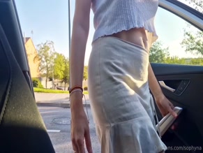 Sophyna gets in car, no bra