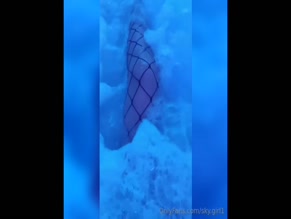 sky.girl1: Fishnet covered legs in bath no explicit body parts visible