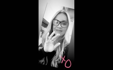 Jacey Birch Blows Kiss in Black and White