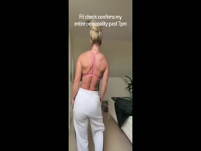 New UK Gladiators00:00 Woman displaying bare midriff and upper chest in sports bra.
