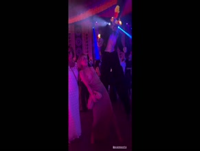 Julianne Hough dances in backless dress at party
