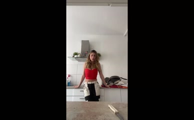 Celina in red top and black and white pants.