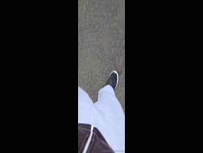 Man's hairy crotch with blue sex toy peeking out.