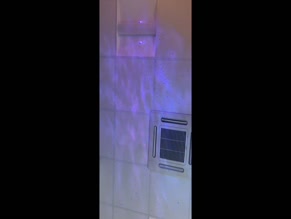 Joanna Levesque: Bare shoulders and upper chest visible during spa facial.