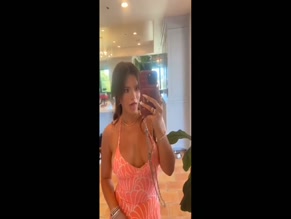 Bella Thorne shows off her tits in a dress.