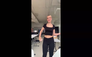 Millie Bobby Brown black crop top tight black leggings midriff exposed