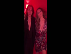 Elizabeth Hurley cleavage dress party