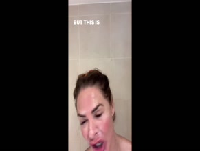 Trinny Woodall bare shoulders, upper chest visible in shower
