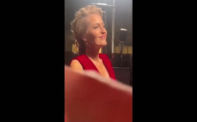 Gillian Anderson sideboob red dress