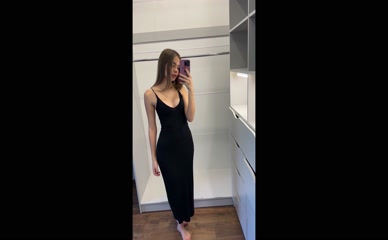 naomimorningstar mirror selfie black dress cleavage
