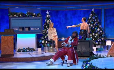 Rachel Riley's Countdown Christmas Special: Leggy Silver Dress & Drunk Santa.