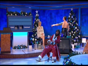 Rachel Riley's Countdown Christmas Special: Leggy Silver Dress & Drunk Santa.