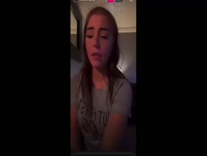 Scarletmay99: Shirt raised, stomach visible, halted prior to chest