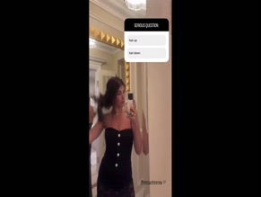 Daniella Monet bare shoulders and legs visible through sheer material