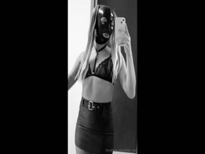 kinkyivy BDSM outfit with latex mask and lace bra
