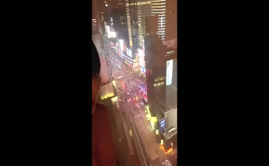 Bai Ling topless Times Square hotel view.
