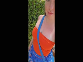 Alexa Jane M Orange Top Cleavage Reveal
