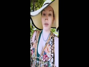 Katherine Ryan cleavage sunhat.