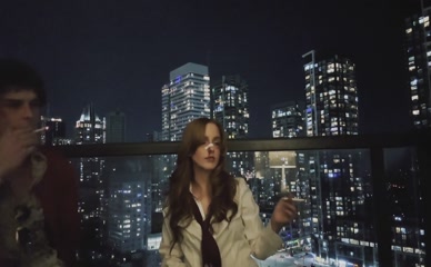 Mckenna Grace smoking on balcony with male, bandage on nose