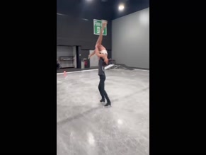 Vanessa Bauer exposed abdomen and upper thighs ice skating