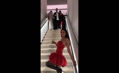 Victoria Justice in a red dress at a party