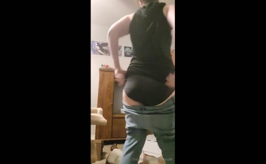 Greentea98 pulls up jeans.