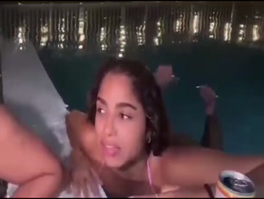 AyannaMarcelin ass tease in pink bikini