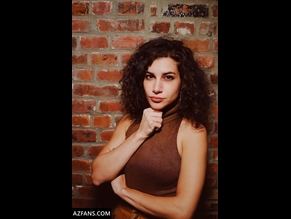  alt="Naomi Karavani"