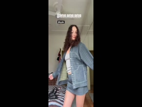Abbie Chatfield tits and ass in skirt and top.