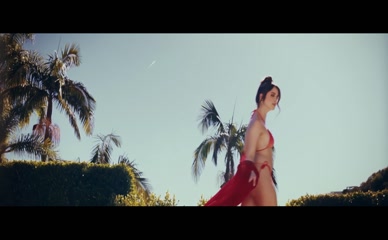 Laura Marano bikini poolside.