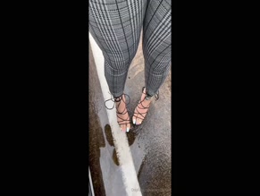 pinkyyperfect's feet in strappy heels on wet pavement