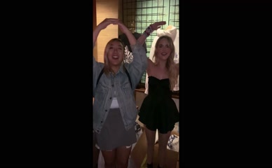 Mckenna Grace dances in a short black dress.