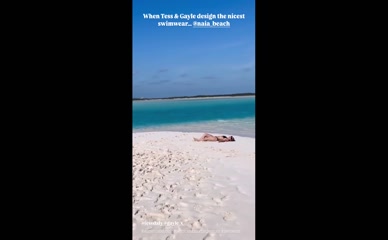 Laura Hamilton bikini body beach display.