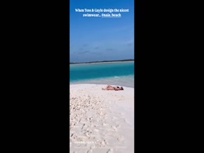 Laura Hamilton bikini body beach display.