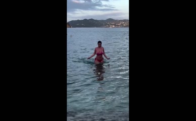 Colleen Sheehan bikini beach walk