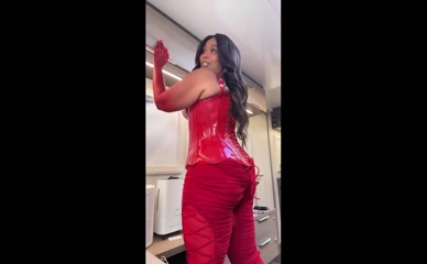 Lizzo big tits red corset.