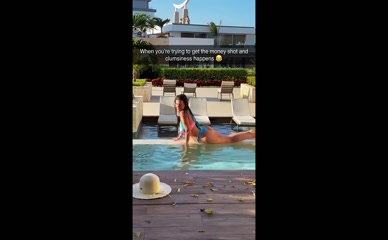 Chanel West Coast slips into pool.
