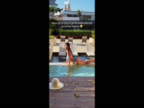 Chanel West Coast slips into pool.