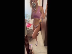 tefi_santi woman in sports bra and thong panties