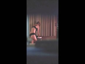 Tracy Spiridakos black bra and panties, buttocks in panties, breasts in bra.