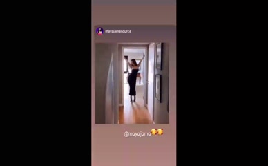 Maya Jama in a tight black dress.