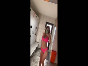knopavika woman wearing pink bikini, private parts covered