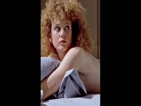 Nicole Kidman bares full back and buttocks.