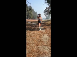 marriedandheelsof Denim Skirt and Big Boobs in Grassy Field