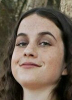 WHO IS SHE
