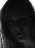 CAROLINE ABRAS