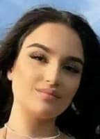 JUSTINE MIRDITA